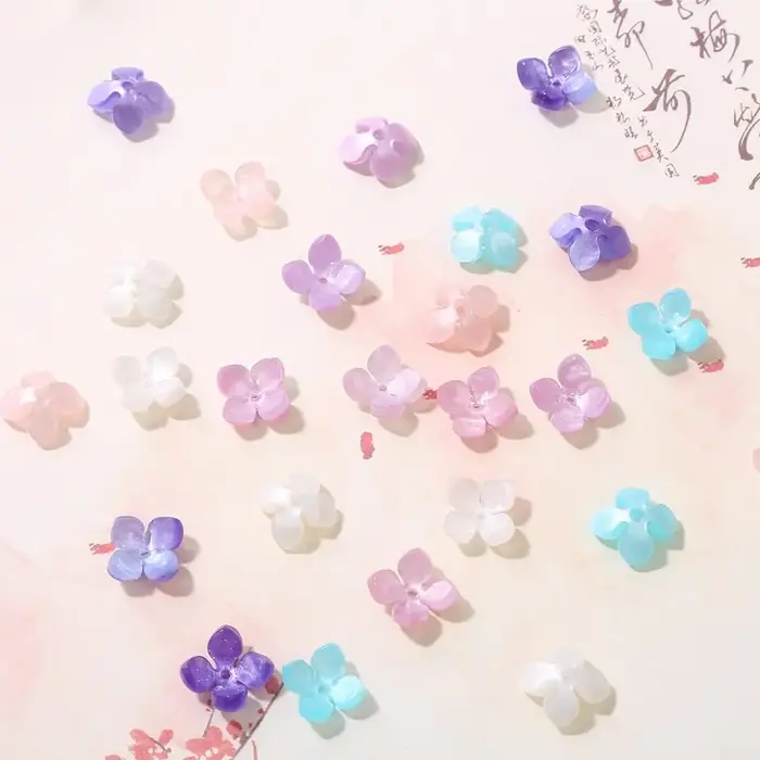 Perles d'espacement en forme de fleur à quatre pétales pour bijoux
