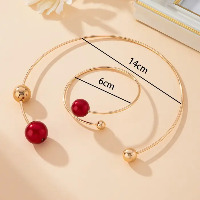Ensemble collier et bracelet assortis rouge et or