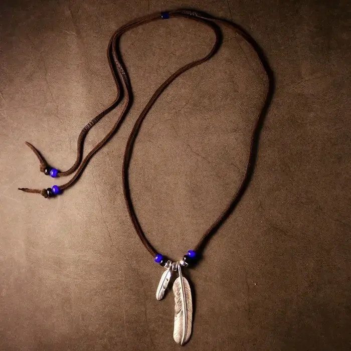Collier en corde de cuir avec pendentif Turquoise en plumes rétro indiennes, conçu par Niche pour ho