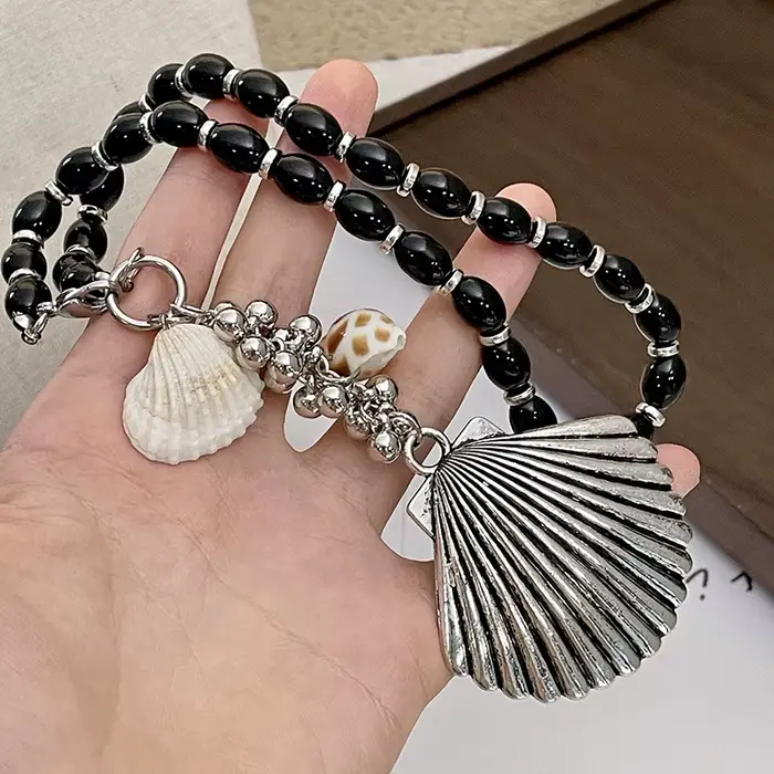 Pendentif coquille de conque