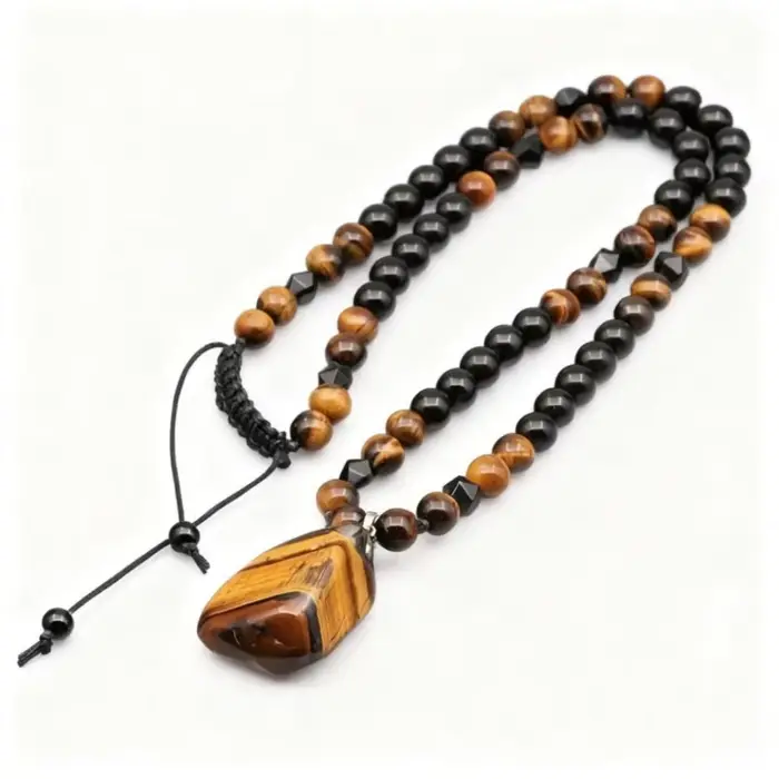 Collier en pierre d'oeil de tigre pendentif en perles noires pour femmes classique et audacieux pour anniversaire et occasions spéciales